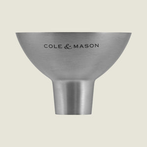 The Cole & Mason London Chocolate Wood Pepper Mill 400mm comes with a brushed stainless steel refill funnel, ideal for gifting or stylish kitchen use.