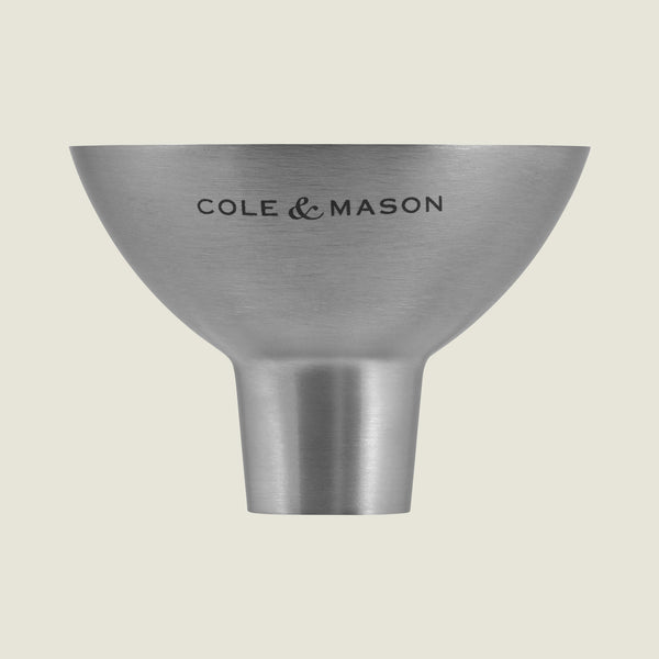 The Cole & Mason London Chocolate Wood Pepper Mill 400mm comes with a brushed stainless steel refill funnel, ideal for gifting or stylish kitchen use.