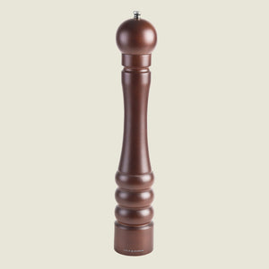 The Cole & Mason Beech Capstan Pepper Mill 400mm stands upright on a plain light background, featuring dark-stained beech wood, a rounded top, grooved base design, and adjustable grind for customized seasoning.