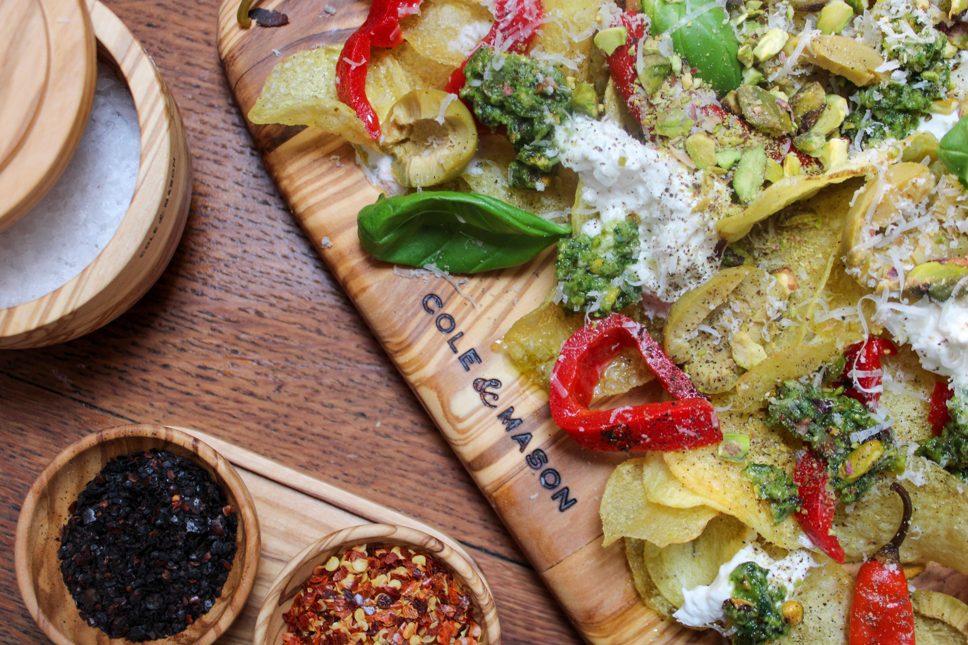 Loaded Truffle Crisps with Pistachio Pesto, Peppers and Pecorino