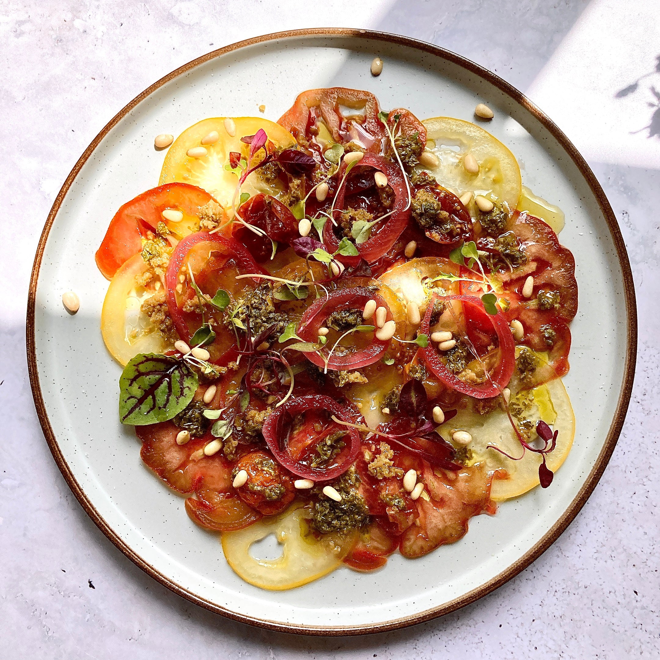 Beef tomato carpaccio with green olives tapenade Cole & Mason UK