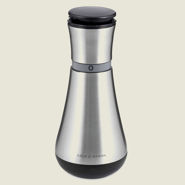 The Cole & Mason UK Henley Oil & Vinegar Pourer 180mm features a sleek, modern carafe design with a black top and base, plus a visible adjustment ring near the top.