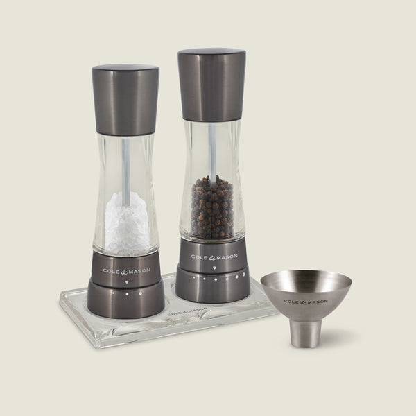 #irongrey The Cole & Mason Derwent Salt & Pepper Mill, Acrylic Tray & Funnel Set includes two mills—one for salt, one for pepper—presented on a sleek acrylic tray with a handy metal funnel for easy refilling.
