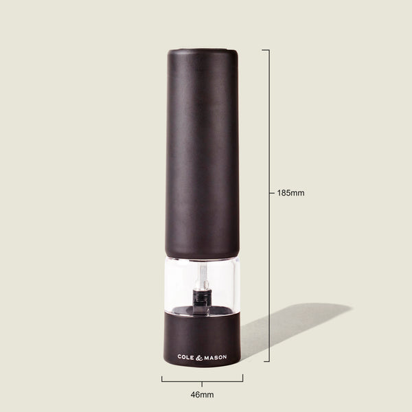 A sleek Brixton Electric Mill Matt Black GS from Cole & Mason, featuring a durable ceramic grinder for consistent results, measures 185mm tall by 46mm wide. Displayed on a light background, this electric mill offers convenient one-handed operation.