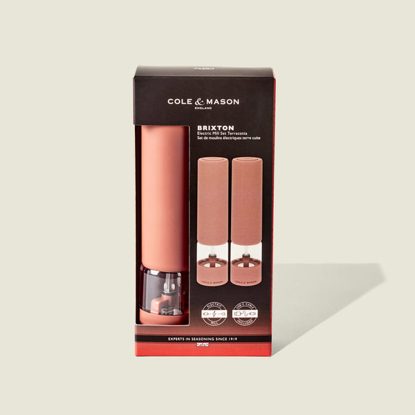 Cole & Mason Brixton Electric Mill Terracotta GS, featuring a premium ceramic grinding system, packaged in a black and clear box with product images and branding on the front.