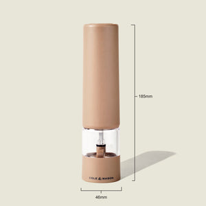 The Brixton Electric Mill Stone GS by Cole & Mason is a tan electric pepper grinder featuring a ceramic grinding core and a transparent midsection, with the COLE & MASON branding displayed. It stands upright at 185mm tall and 46mm wide on a plain light background. The adjustable grind setting allows you to precisely customize your seasoning to taste.