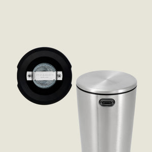 A stainless steel cylindrical Electric Derwent Salt & Pepper Mill with a USB-C port, shown upright. Next to it is a close-up of its base, revealing a transparent window and the Cole & Mason brand mark.