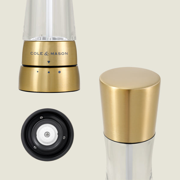 The Cole & Mason Derwent Gold Salt & Pepper Mills are shown from the front, top, and bottom, highlighting their gold-tone stainless steel design and advanced grinding technology.