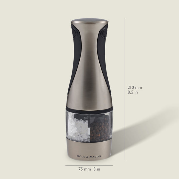 A metallic Cole & Mason Kew Electronic 2-in-1 Duo Mill salt and pepper grinder, featuring a transparent chamber, adjustable grind settings, and measuring 210 mm tall by 75 mm wide, displayed against a light background.