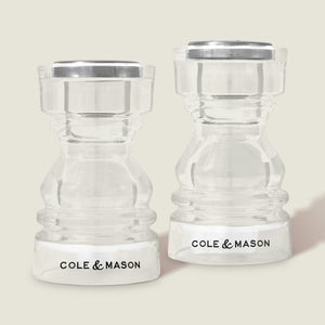 #86mm 
Two clear Cole & Mason London Acrylic Salt & Pepper Shakers with silver tops and black branding on their bases, displayed side by side against a light background.