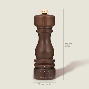 A Cole & Mason London Walnut Salt or Pepper Mill made from dark walnut wood stands upright, with its height (180 mm, 7.2 in) and width (58 mm, 2.4 in) indicated.