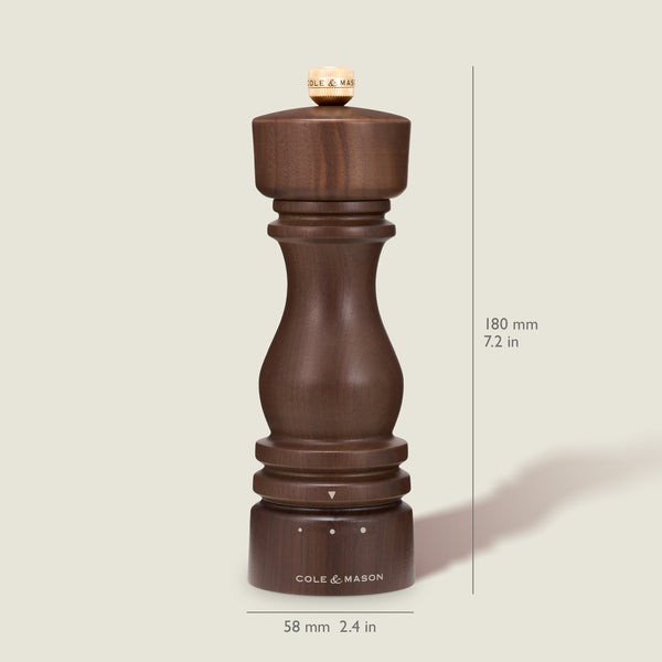 A Cole & Mason London Walnut Salt or Pepper Mill made from dark walnut wood stands upright, with its height (180 mm, 7.2 in) and width (58 mm, 2.4 in) indicated.