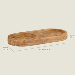 The Cole & Mason Portobello Olive Wood Mill Tray features two round indentations, measuring 185 x 87 x 18 mm—perfect for organizing salt and pepper mills on your kitchen counter. Displayed against a light background.