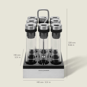 The Shadwell Countertop Spice Storage by Cole & Mason features eight airtight glass tubes with metal lids in a sleek black and silver stand—perfect for stylish, organized countertop storage (220mm H x 140mm W x 140mm D).