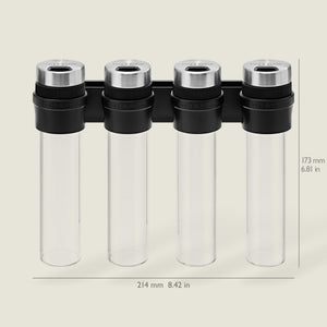 The Cole & Mason Shadwell Slim-Mount Spice Storage features four clear airtight glass containers with silver lids in a black rack, measuring 173 mm high and 214 mm wide.
