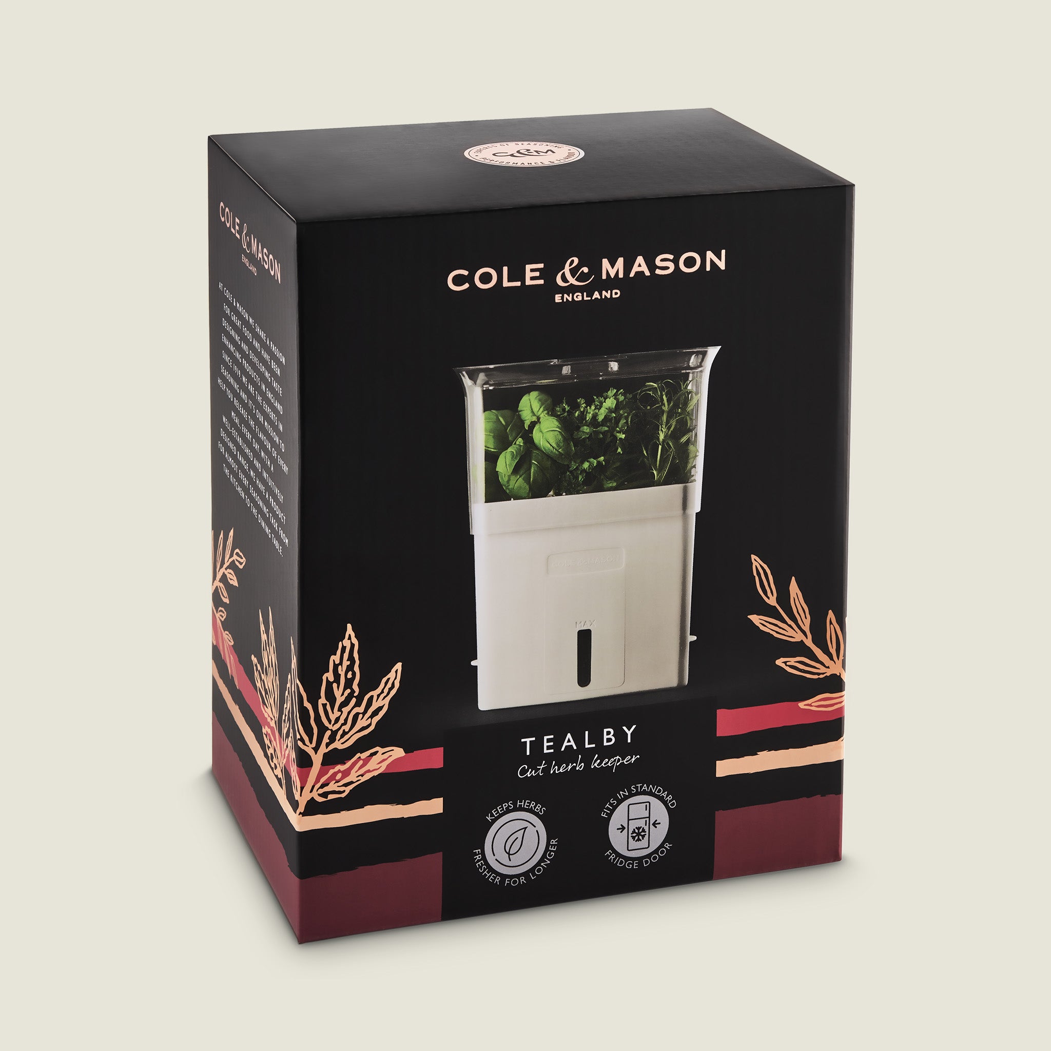 Cole & Mason Tealby Cut Herb Keeper in black and pink packaging, showing the white self-watering herb keeper with fresh herbs inside and decorative herb illustrations on the box.