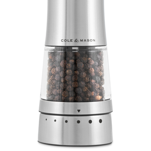 A stainless steel pepper grinder filled with black peppercorns, the Cole & Mason Electric Derwent Salt & Pepper Mill is inspired by the Electric Derwent collection and offers effortless seasoning.