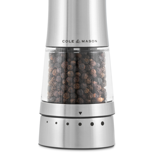 A stainless steel pepper grinder filled with black peppercorns, the Cole & Mason Electric Derwent Salt & Pepper Mill is inspired by the Electric Derwent collection and offers effortless seasoning.