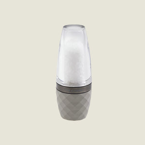 The Cole & Mason City Concrete Mill 160mm features a modern design with adjustable grind settings, a clear top filled with salt crystals, and a textured light gray base. It stands upright on a plain, light background.