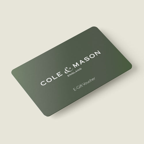 A dark green rectangular Cole & Mason UK e-Gift Voucher with rounded edges, featuring the text "Cole & Mason England" and "UK e-Gift Voucher"—ideal for selecting premium kitchenware or stylish salt & pepper sets.
